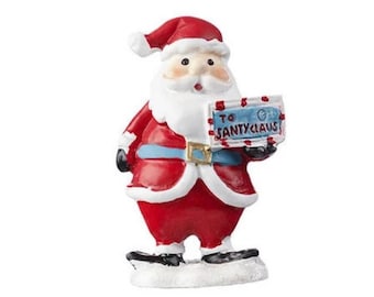 Miniature Santa Holding a Letter