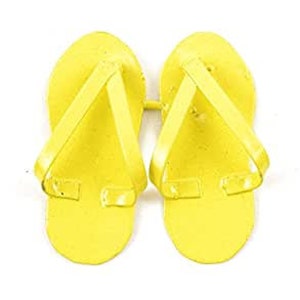 May include: A pair of yellow metal flip-flop shaped wall hooks.