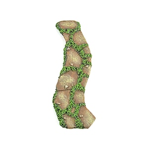 May include: A brown stone path with green moss growing between the stones. The path is curved and has a rough texture.