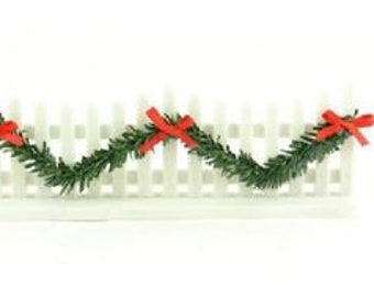 White Christmas Fence with Green Garland