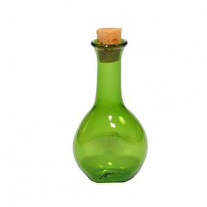 May include: A small, green glass bottle with a cork stopper. The bottle has a round body and a narrow neck.