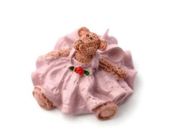 Miniature Teddy Bear in a Pink Dress