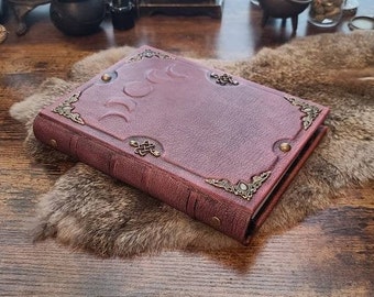 Limited edition.  Refillable Mysterious Moon phases blank leather journals.  6 ring binder.  Handmade. IN STOCK