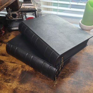 Grimoire.  Book of spells.  Notebook.  Leather. Black leather journal