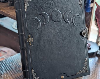 Black Moon phases leather 3-ring binder by Velimira.  letter size