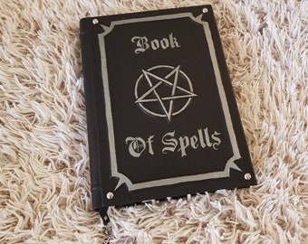 Large book of spells.  Grimoire.  Leather book of shadows