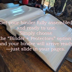 May include: An open binder with clear plastic sleeves, ready for use. The text on the image reads: "Get your binder fully assembled and ready to use. Simply choose the 'Binder + Protectors' option, and your binder will arrive ready - just slide in your pages."