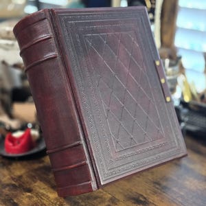Giant medieval blank leather journal by Velimira Designs.  1000 sheets.