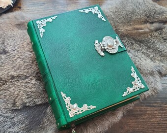 Compact green blank leather journal by Velimira Designs. In stock