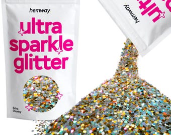 May include: A white resealable pouch of extra chunky glitter labeled "hemway ultra sparkle glitter". The pouch is open and pouring out gold, silver, and iridescent glitter.
