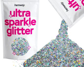 May include: A white resealable pouch with the text "hemway ultra sparkle glitter" in pink letters. The pouch is open and pouring out silver glitter with star-shaped pieces.