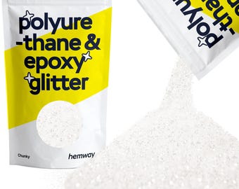 May include: A white bag of chunky glitter labeled "polyure-thane & epoxy glitter". The bag is open and pouring out the glitter, showing the white glitter.
