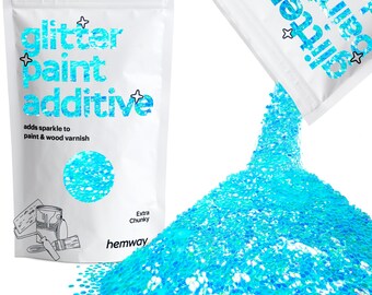 May include: A bag of blue glitter paint additive, labeled "glitter paint additive" and "adds sparkle to paint & wood varnish". The bag is open and pouring out the glitter onto a white surface.