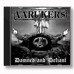 May include: Black and white CD cover with the band name "VARUKERS" in bold white letters. The cover features a person with a mohawk wearing a black leather jacket with a large anarchy symbol on the back. The text "Damned and Defiant" is at the bottom of the cover.