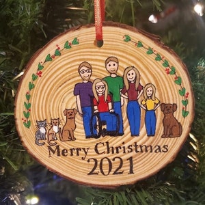 Personalized family ornament with wheelchair, hand painted on a 3.5-4 inch wood slice