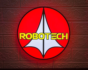 May include: A red circle with a white triangle and the word "ROBOTECH" in yellow letters.