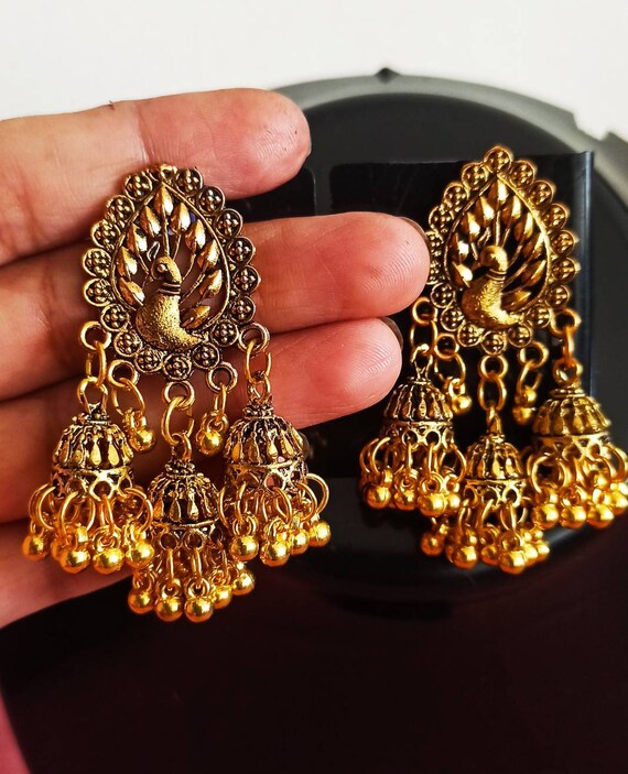 Gold on sale triple jhumka
