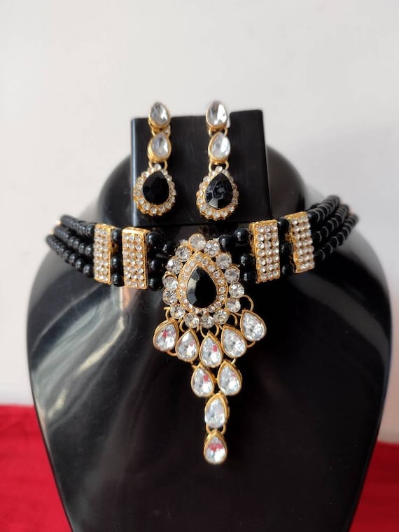 Brass,Pearl And Beads Black Kundan Choker Necklace Set at Rs 699