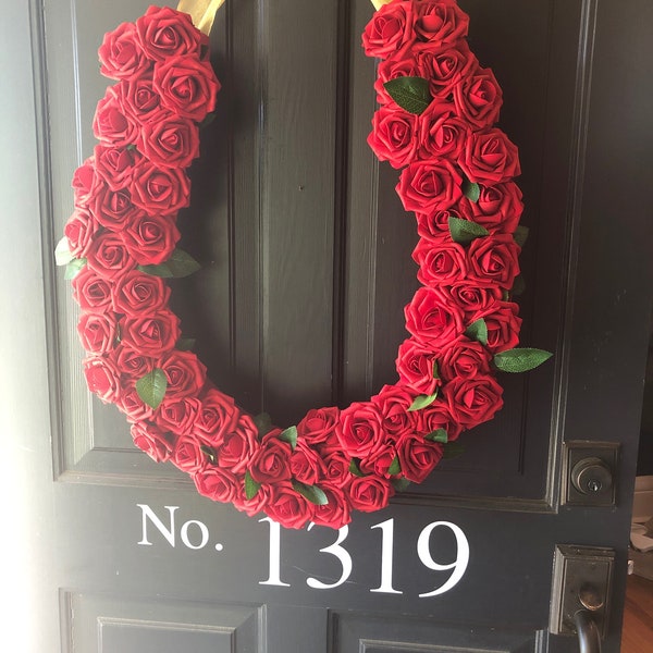 Corona de herraduras Derby, corona de rosas Derby