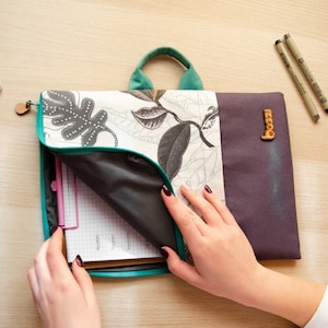 Zippered portfolio. A4 document folder case. Tablet holder with handstrap.