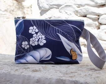 Extra large pouch wristlet. Made from Cotton Canvas fabric Decorated with blue leaves.