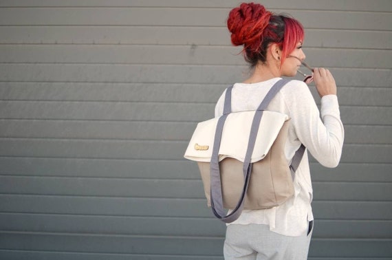 Large convertible backpack / tote bag. Three diferent sizes convertible bag to fit all your needs .