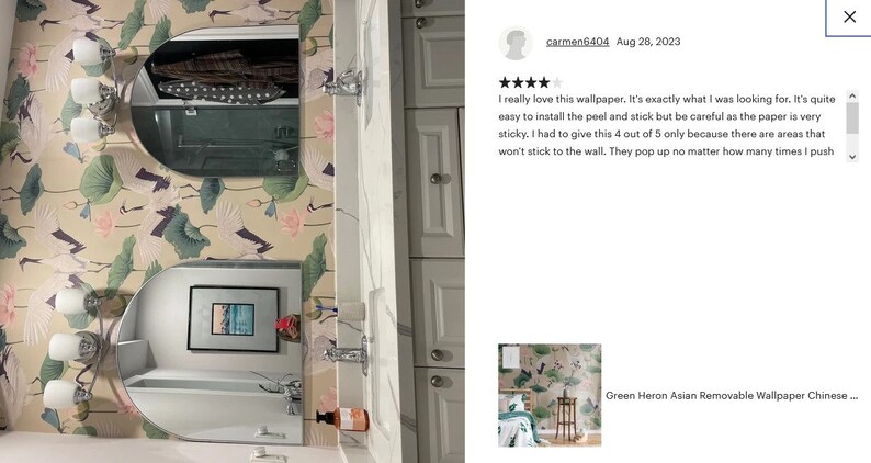 May include: A bathroom with a white vanity and two round mirrors. The walls are covered in a peel and stick wallpaper featuring a green heron and lotus flower design. The wallpaper is described as "Green Heron Asian Removable Wallpaper Chinese" in the image.