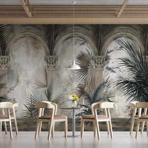May include: A dining room with four wooden chairs and a small round table. The wall is decorated with a mural of a tropical garden with arches and columns.