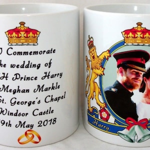 May include: White ceramic mug with a royal wedding commemorative design. The mug features a photo of Prince Harry and Meghan Markle, a crown, a lion, a unicorn, and the text "To Commemorate the wedding of HRH Prince Harry & Meghan Markle at St. George's Chapel Windsor Castle 19th May 2018".