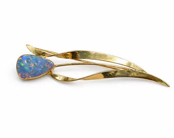 Brosch i 9 karat guld med opal