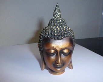 Tête de bouddha en plâtre  de couleur bronze