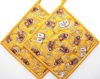TWO Quilted Fabric Potholders, 8.5" Square, Heat Resistant Potholders covered in Bluebirds, Birdhouses and Flowers, Birdwatchers Gift