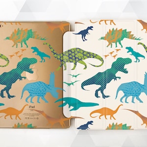 May include: A white iPad case with a colorful dinosaur pattern. The case features a variety of dinosaurs in shades of blue, green, orange, and yellow. The case is designed to fit an iPad.