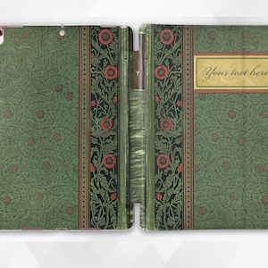 May include: A green and red patterned iPad case with a gold label that says "Your text here".