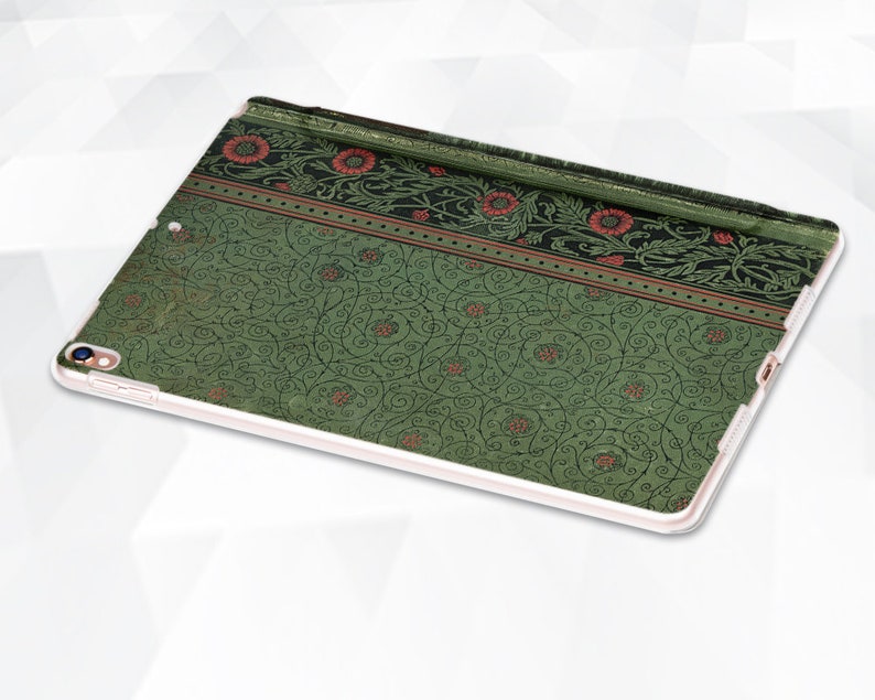 May include: Green iPad case with a floral pattern. The pattern features red flowers and green leaves on a white background.