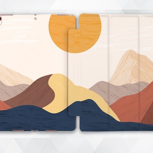 Pode incluir: Uma capa para tablet com um design minimalista que apresenta uma paisagem estilizada com montanhas, um sol e um céu azul. A capa é feita de um material durável e tem uma aba dobrável para proteção.