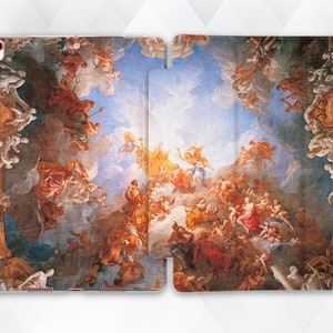May include: A phone case featuring a detailed painting of a ceiling with a sky and clouds, and many figures in white and gold clothing. The figures are arranged in a circular pattern around the center of the painting.