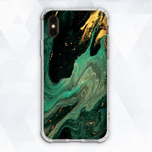 May include: A clear phone case with a green and gold abstract marble design. The case has a cutout for the phone's camera.