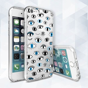May include: A clear phone case with a white background and a pattern of blue and black eyes. The case is designed for an iPhone.