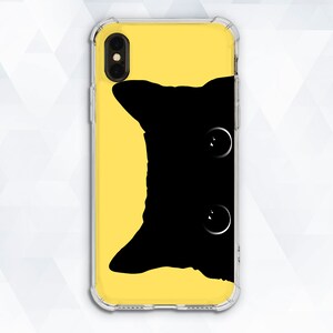 May include: A clear phone case with a yellow background and a black silhouette of a cat peeking from the right side.