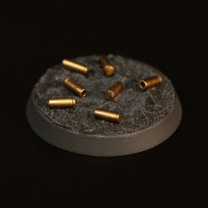 64 large bullet casings or unfired rounds for miniature basing (32mm scale)