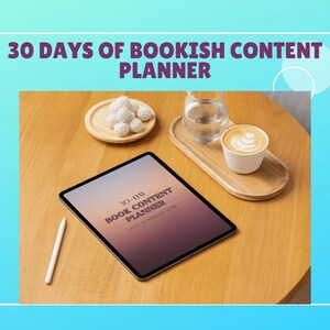 May include: A digital tablet displaying "30 DAYS OF BOOKISH CONTENT PLANNER" rests on a wooden table, with a stylus beside it. A small plate of white sweets, a glass of water, and a coffee cup with latte art are also present. The background is a blue gradient.