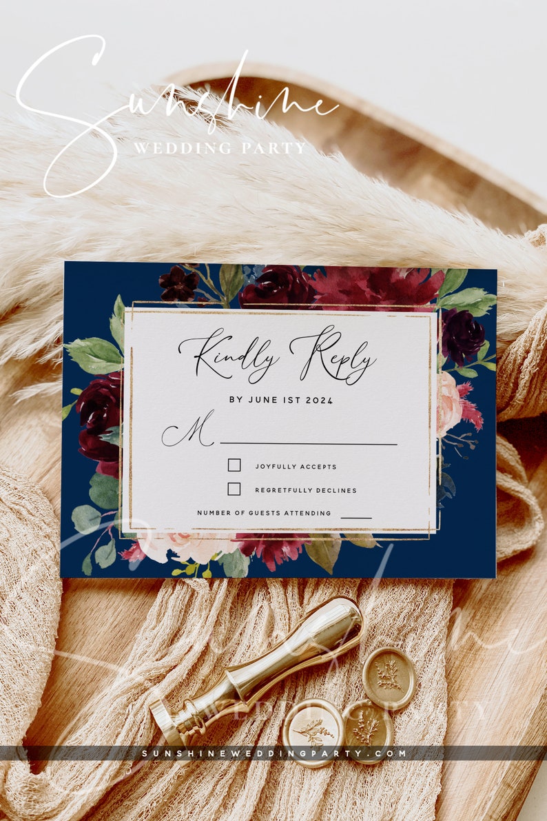 May include: A navy blue wedding RSVP card with a gold border and floral design. The text reads "Kindly Reply by June 1st 2024". There are two checkboxes for "Joyfully Accepts" and "Regretfully Declines".