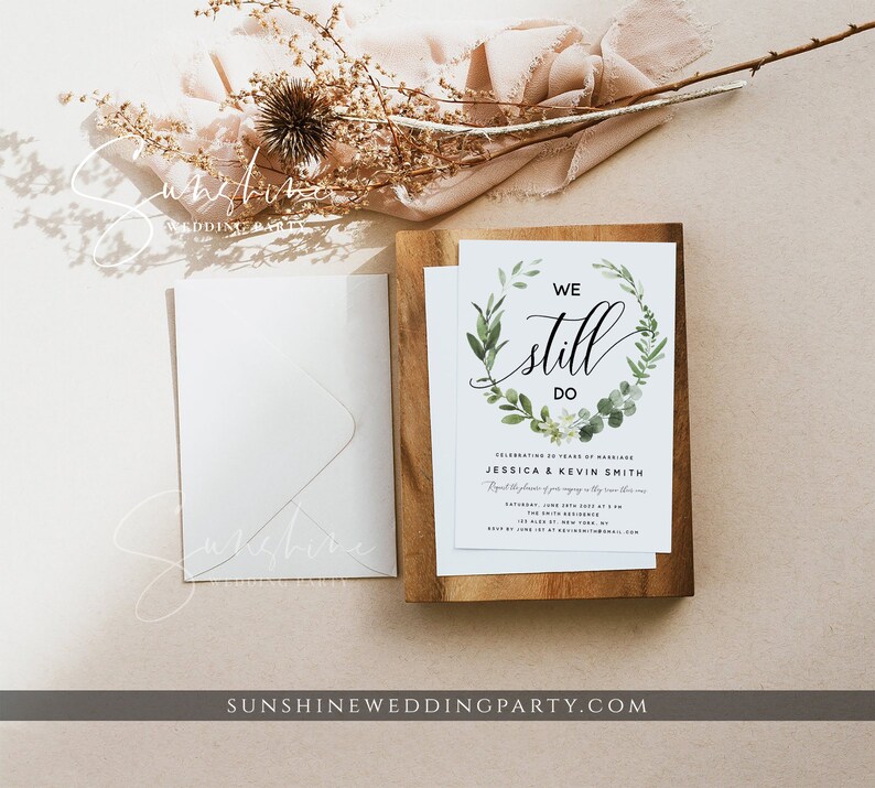 May include: A wedding invitation with a green floral wreath and the text "We Still Do" in black calligraphy. The invitation is for Jessica & Kevin Smith celebrating 30 years of marriage. The invitation includes the date, time, and location of the event.