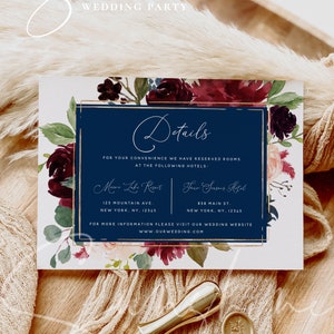 May include: A wedding invitation with a navy blue background and gold accents. The invitation features a floral design with burgundy and pink flowers. The text on the invitation reads "Details" and provides information about hotel accommodations for the wedding. The text also includes the website address "www.ourwedding.com".