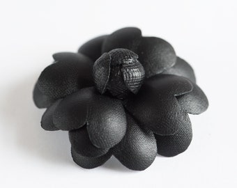 Black leather camellia brooch