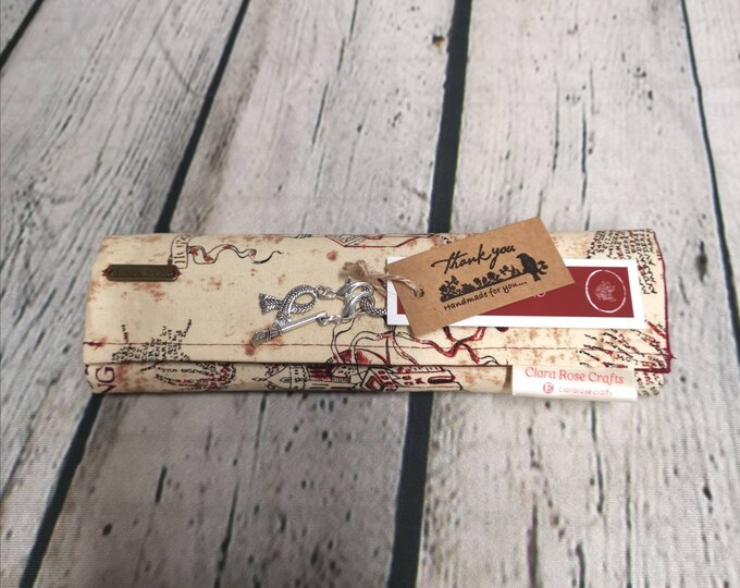 Magical Theme Map crochet hook case with 12 crochet hooks.