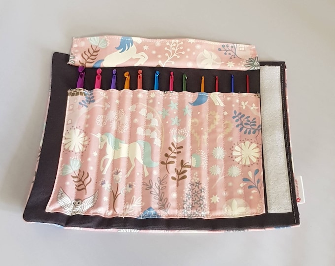 Unicorn Theme crochet hook case with 12 crochet hooks.