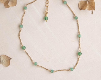 Dainty green Jade Daisy necklace made with upcycled green jade beads, sterling silver or gold filled chain