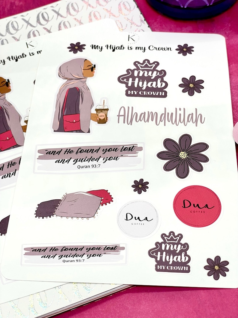 May include: A set of stickers featuring a woman wearing a hijab and holding a cup of coffee. The stickers also include the text "My Hijab is my Crown", "Alhamdulilah", "and He found you lost and guided you Quran 93:7", and "Dua".